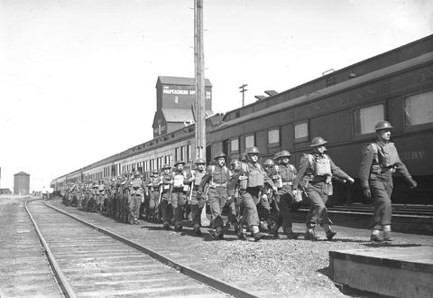 Soldiers arriving for the opening of the Canadian Infantry Basic Training Center No. 133 in Wetaskiwin, - 6 April 1943